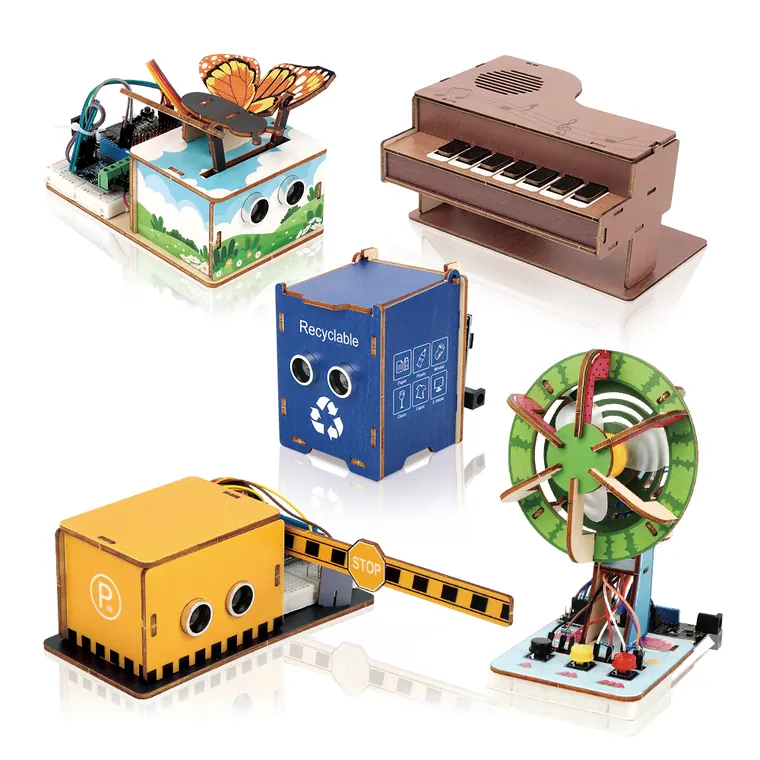 Assembled starter kit models including a bird box, piano and ferris wheel